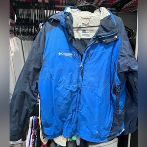 Colombia wind breaker jacket, with detachable hood.